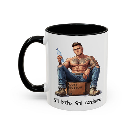 Mug with a graphic of a shirtless man sitting on a suitcase, holding a bottle, with text 'Still broke! Still handsome!' on a white background.