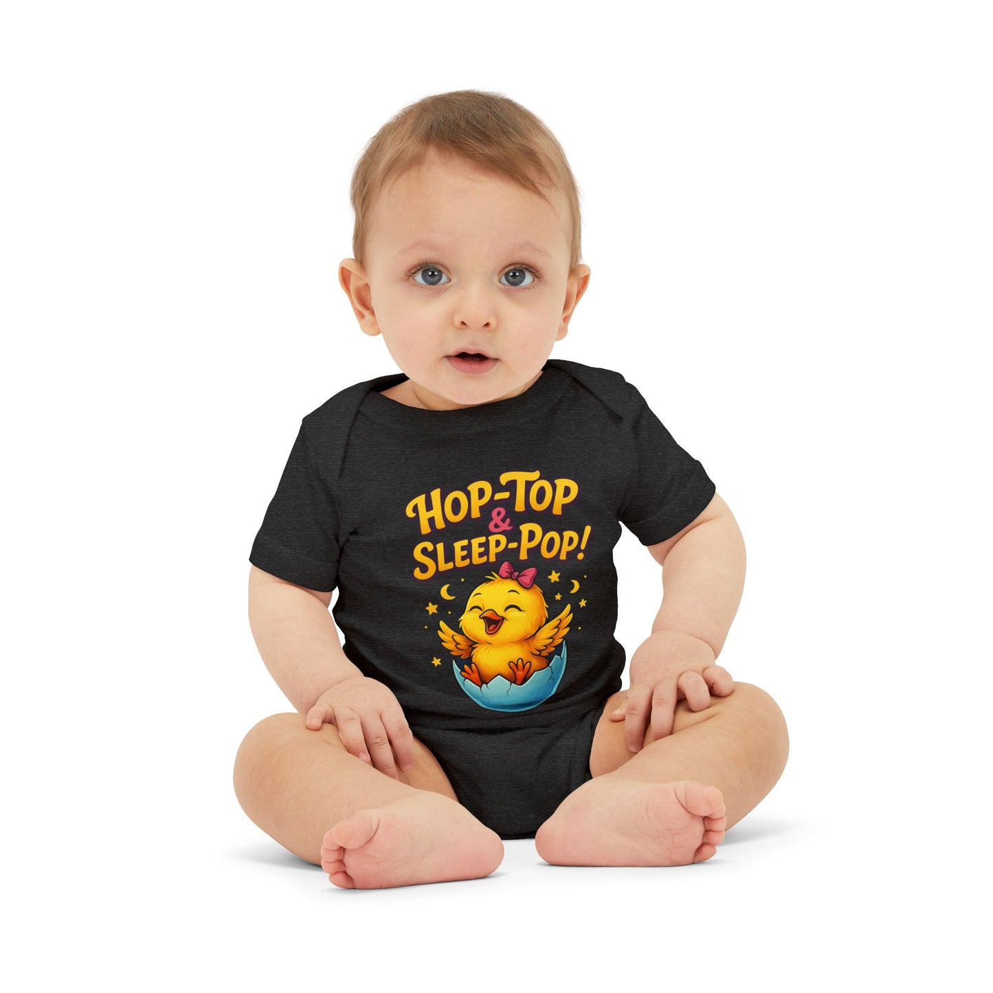 Baby wearing a black onesie with a funny cartoon chicken design .